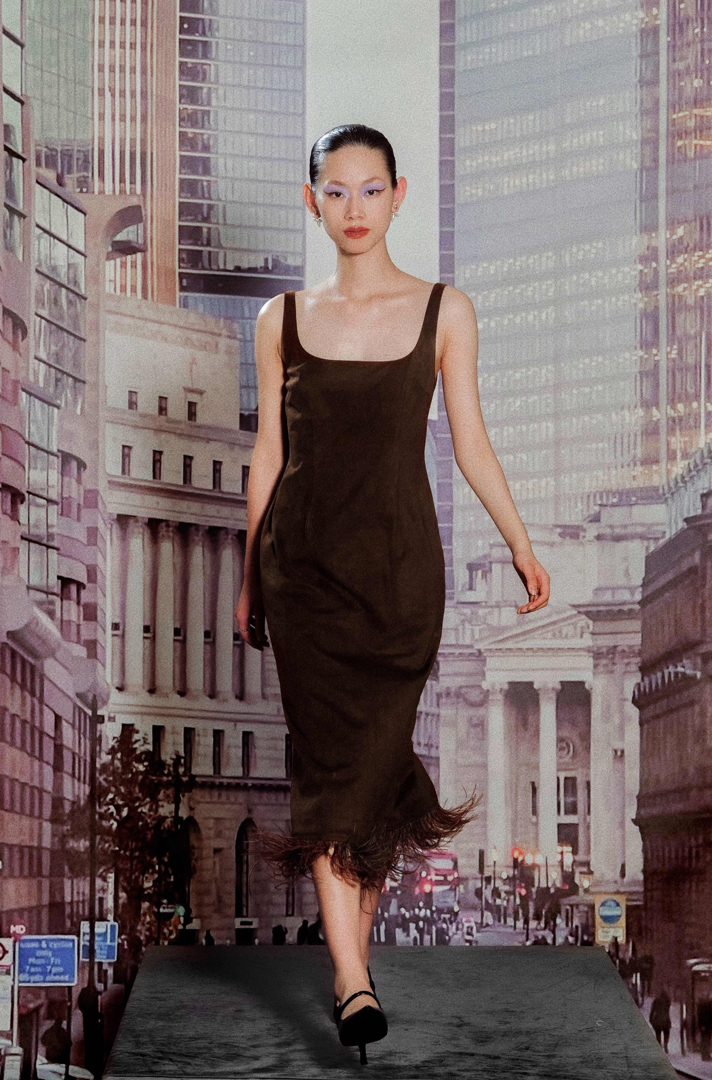Model wearing slim-fit ostrich suede midi dress