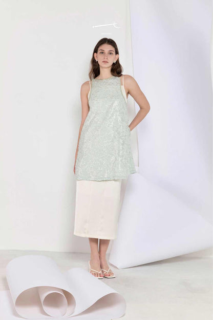 Model wearing mint sequin jacquard
a-line skirt top