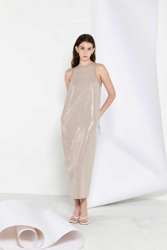 Model wearing cocoon-shape sequin
maxi dress with side slit
