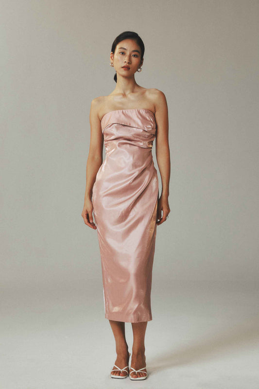 Model wearing pink satin maxi sheath
dress with waist pleats