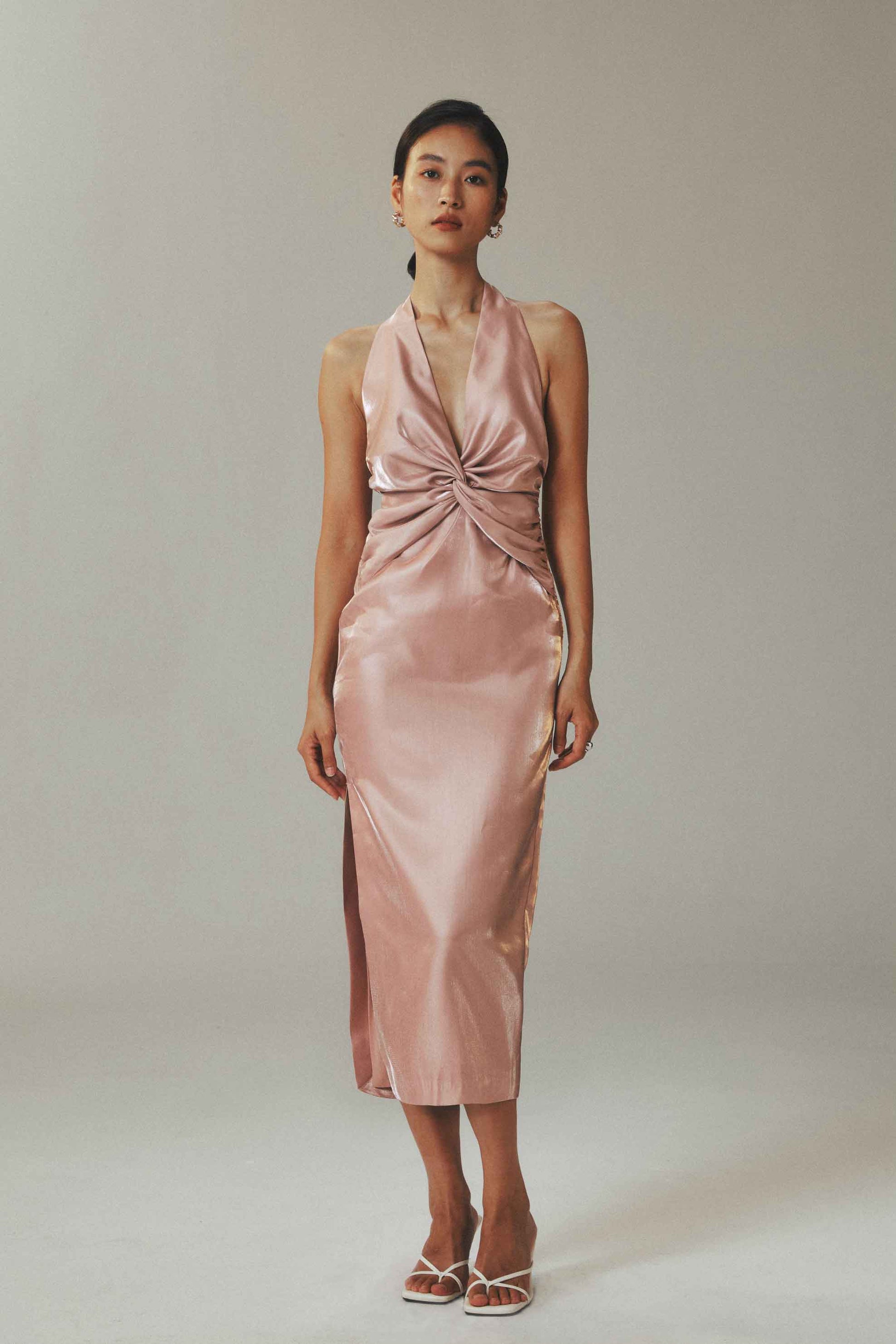 Model wearing Pink Satin Teardrop
Cocktail Dress with Beaded Back Detail