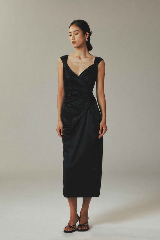 Model wearing black ice-silk maxi dress
with square neckline and pleated waist