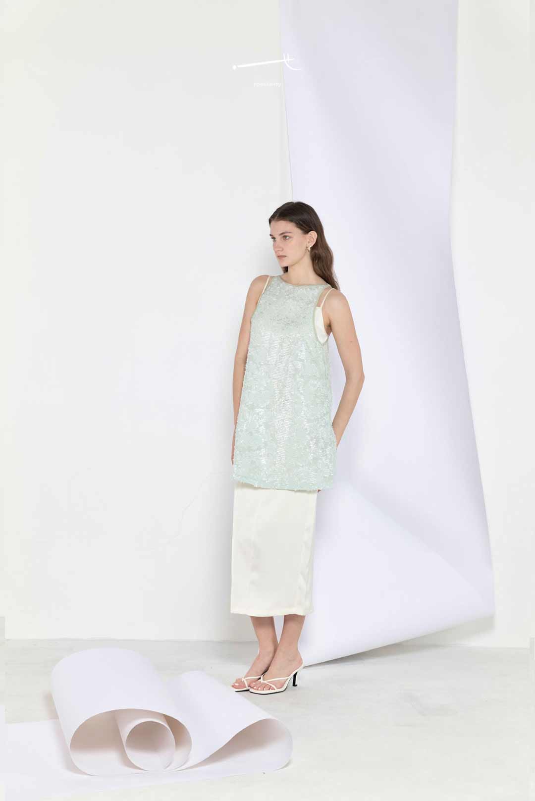 Model wearing mint sequin jacquard
a-line skirt top