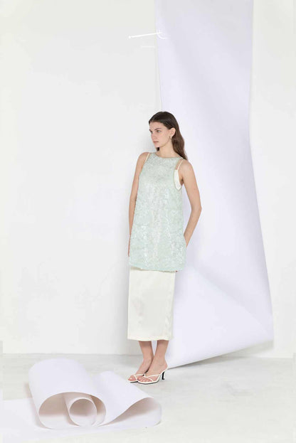 Model wearing mint sequin jacquard
a-line skirt top
