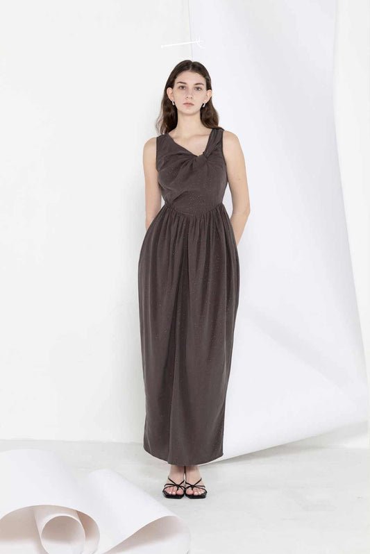 Model wearing star-pleated flower-pod
long dress